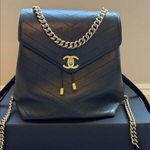 CHANEL Black Chevron Leather Backpack with Gold Hardware